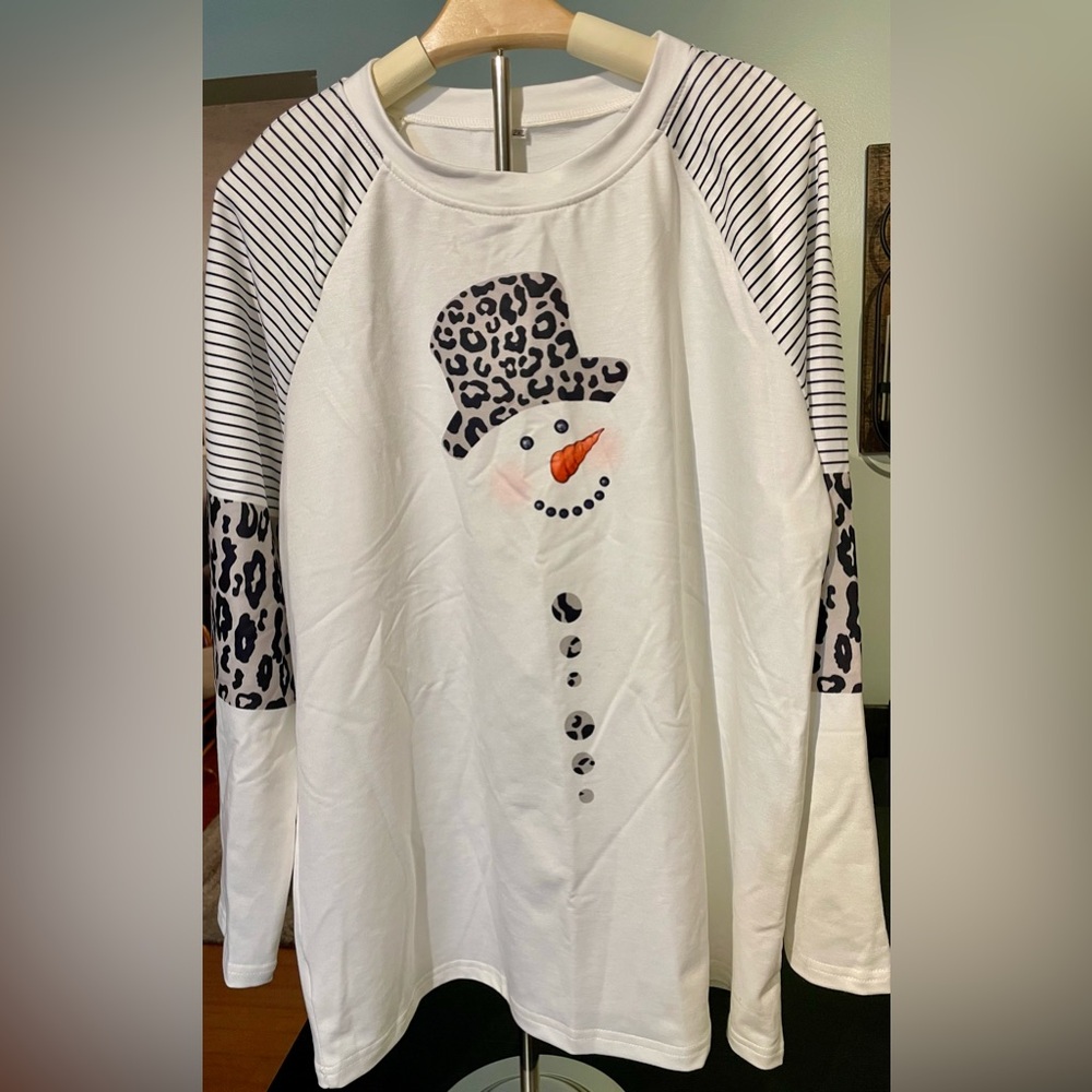 Boutique Long Sleeve Snowman T-shirt with leopard print & stripes on sleeves.